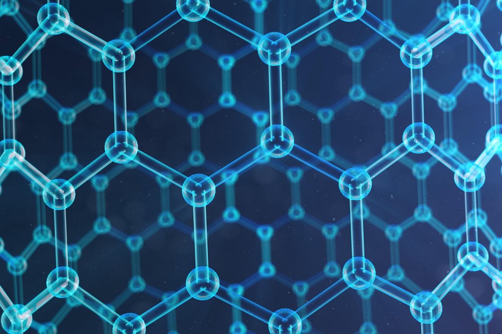 Glowing blue hexagonal lattice of atoms and bonds, seen close up against a dark background.
