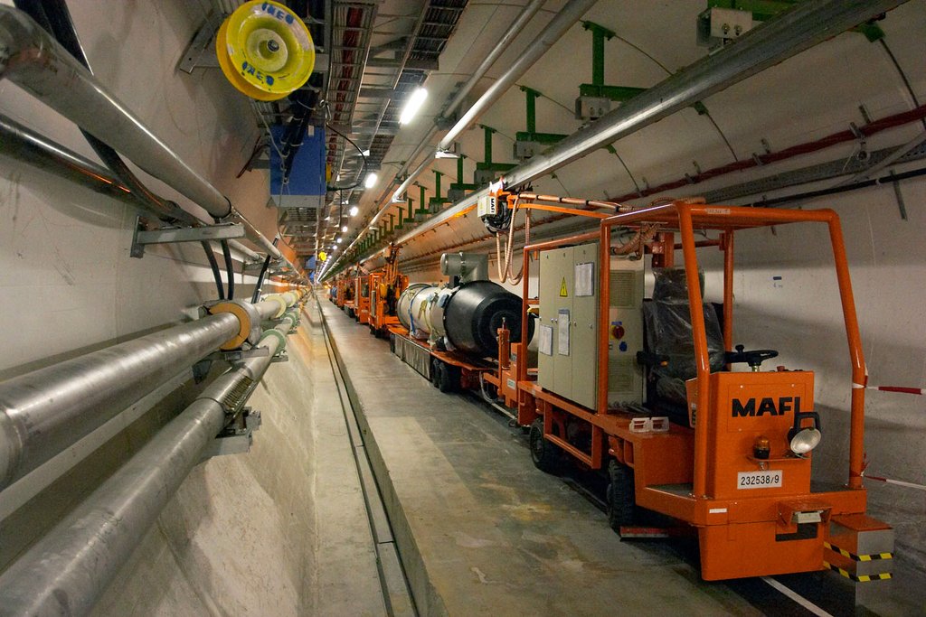 A service vehicle in the Large Hadron Collider tunnel at CERN, beside the machine's cryogenic lines.