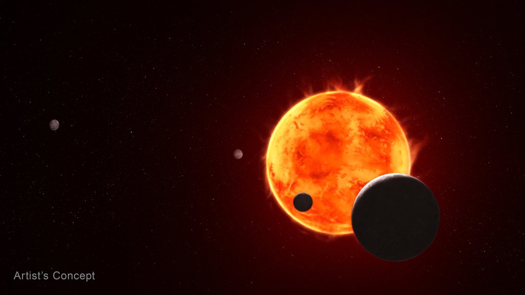 An artist's concept of the planet TRAPPIST-1 e as a dark disk beside its red dwarf star, with two smaller worlds farther out.