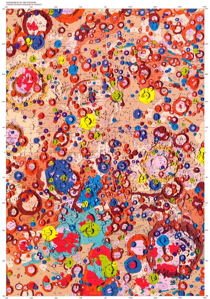 A color geologic map of the Moon's far side, with units shaded in different colors across the hemisphere.